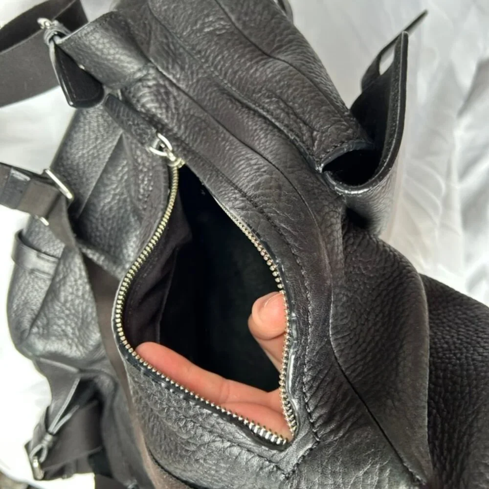 tumi black all weather leather back pack adventure travel